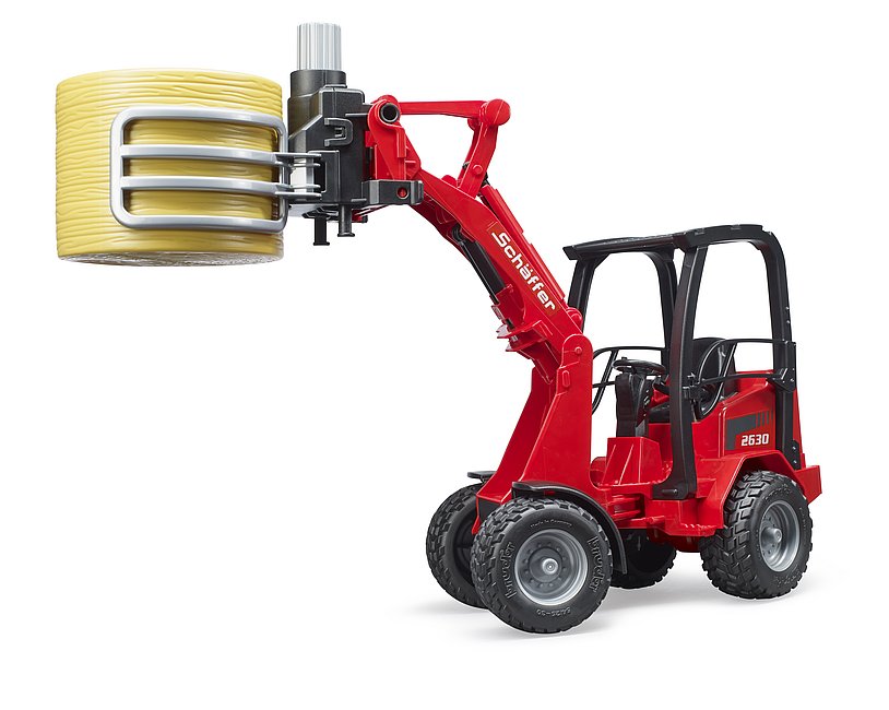 Bruder - Schäffer Hoflader 2630 mit Ballengreifzange + 1 Rundballen